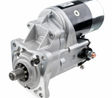 Denso starter motor 12V 2.5kW for Caterpillar T/V forklift series; gray housing, black canister, front pinion gear.