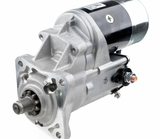 Denso starter motor 12V 2.5kW for Caterpillar T/V forklift series; gray housing, black canister, front pinion gear.