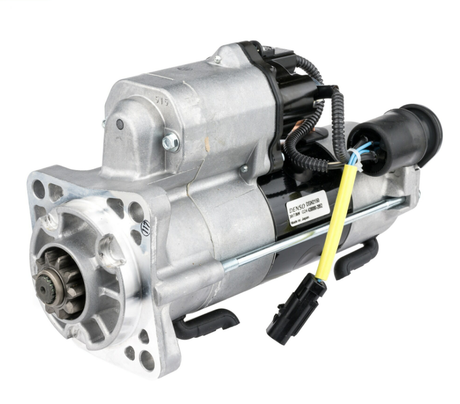 Denso starter motor, 24V 7.8kW for Caterpillar equipment, silver housing with black solenoid.