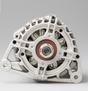Denso alternator, 14V 100A, silver aluminum housing with brown pulley.
