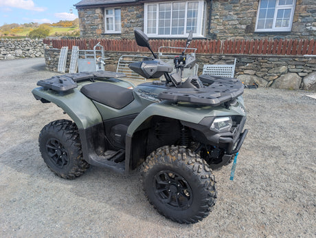 Used CFMOTO CFORCE 520 ATV with front and rear racks, olive-green body, rugged tires.