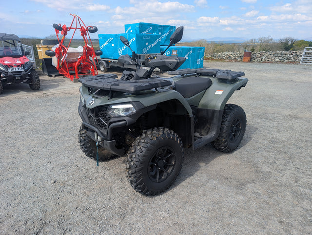 Used CFMOTO CFORCE 520 ATV in green with black racks and rugged tires.