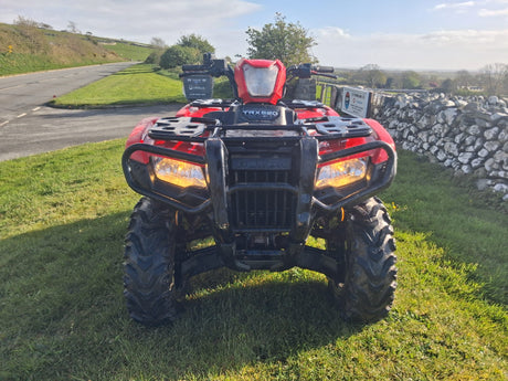 Used Honda TRX 520 FM6 ATV, red, manual transmission, front view