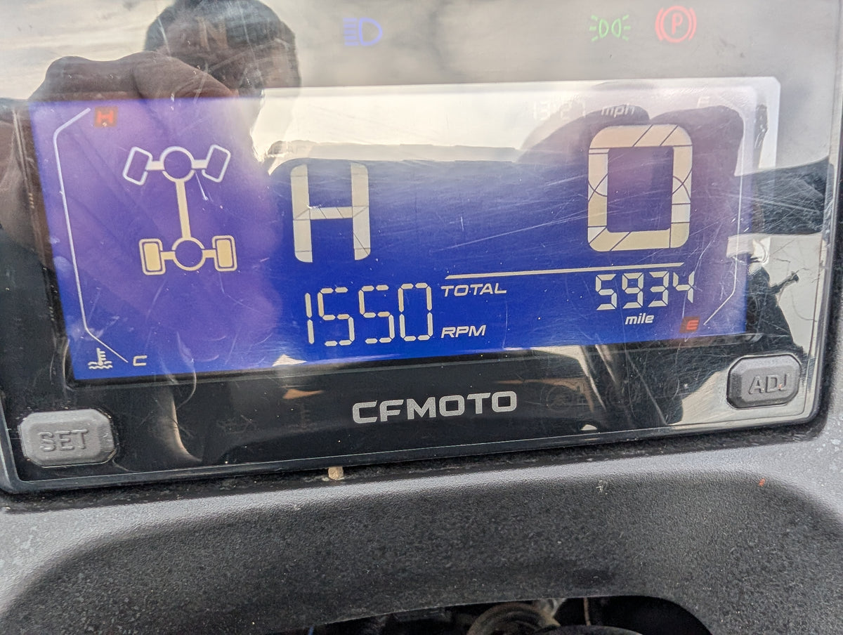 Used CFMOTO CFORCE 520 ATV dashboard with blue digital display and CFMOTO branding