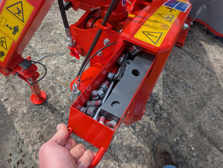 KUHN GMD 240-FF 2.4m disc mower, red frame with yellow decals, 6-disc, hydraulic suspension