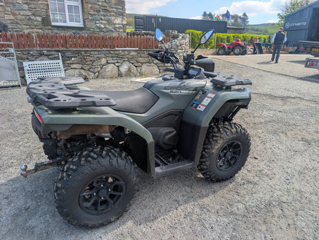 Used CFMOTO CFORCE 520 ATV by DGT Agri, gray with front and rear cargo racks, on gravel.
