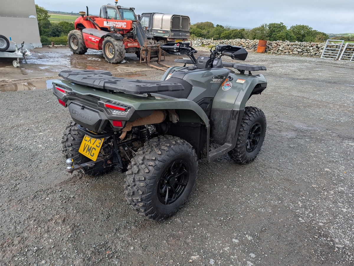Used CFMOTO CFORCE 520 ATV in gray-green with rugged tires and rear cargo rack.