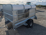 M-TEC quad master trailer with flip-top, silver aluminum utility trailer with rounded lid and sturdy metal frame.