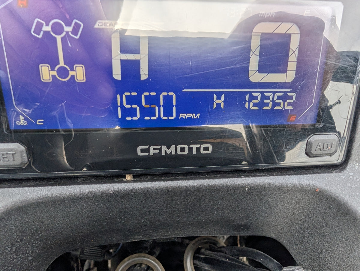 Used CFMOTO CFORCE 520 ATV dashboard with blue digital gauge display
