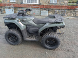 Used CFMOTO CFORCE 520 ATV with front and rear cargo racks, olive-green body, rugged off-road tires.