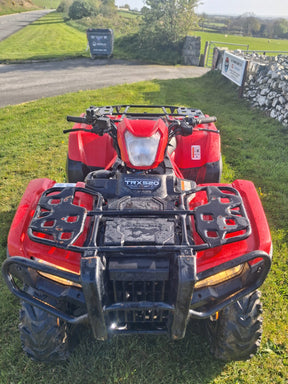 Honda TRX520 red ATV with front rack, manual transmission