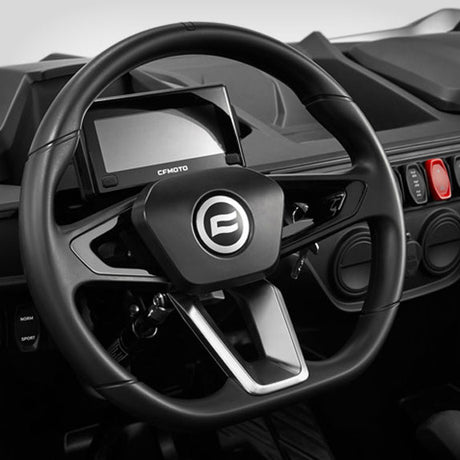 CFMOTO ZFORCE 950 Sport 4 UTV cockpit with black interior, steering wheel and touchscreen display